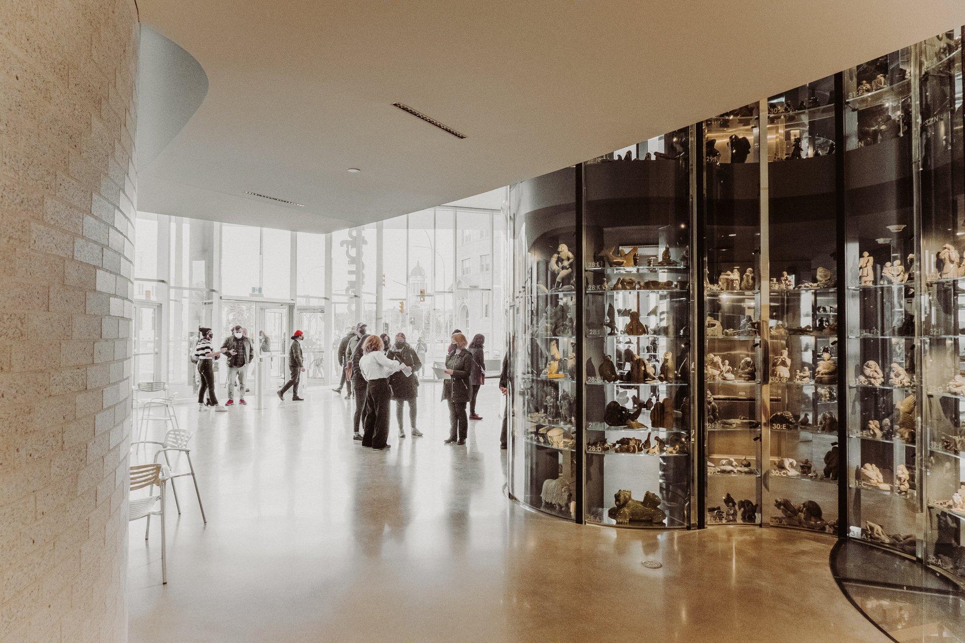 people standing in an art gallery