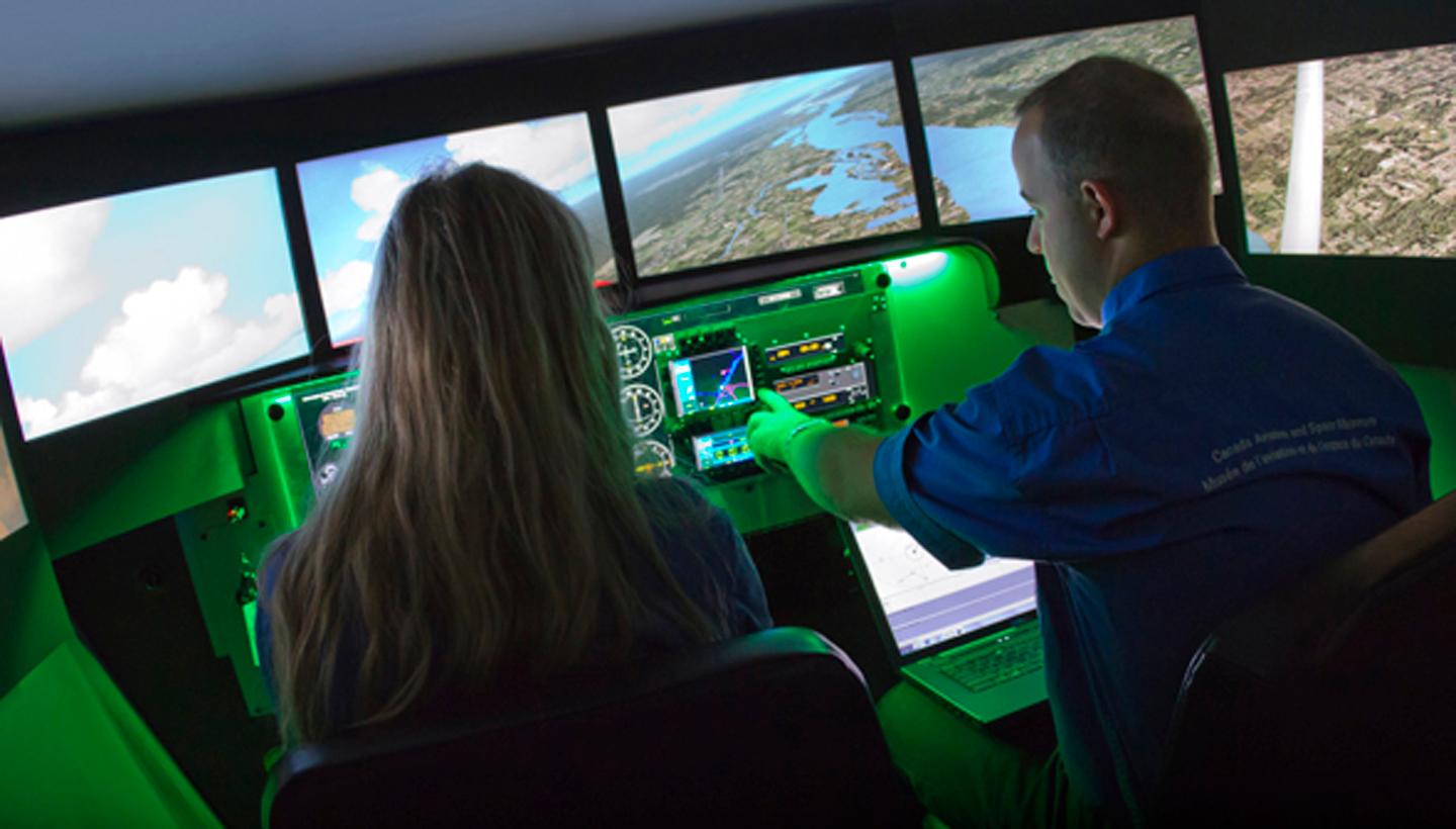 Test your piloting skills - ride the Redbird FMX flight simulator